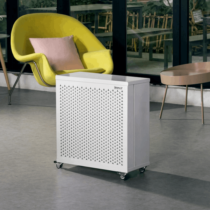 Smart Air Blast Mini air purifier with a metal body and wheels